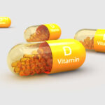 Vitamin D Timing: The Sleep Saboteur? Vitamin D capsules with orange beads inside