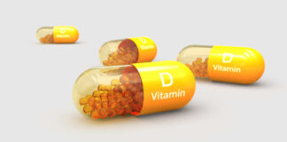 Vitamin D capsules with orange beads inside