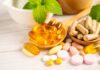 Vitamin Supplements Sabotaging Cancer Treatment? Assorted vitamins and supplements arranged with mint leaves